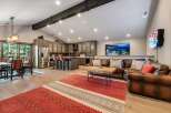 Step into luxury with this stunning property, featuring a spacious open-concept living area.