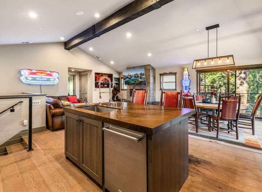 This stunning property boasts a modern kitchen with a large island, perfect for entertaining.