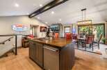 This stunning property boasts a modern kitchen with a large island, perfect for entertaining.
