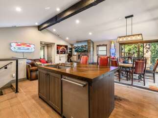 This stunning property boasts a modern kitchen with a large island, perfect for entertaining.
