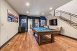 This stunning property boasts a beautifully designed game room, perfect for entertaining and relaxation.