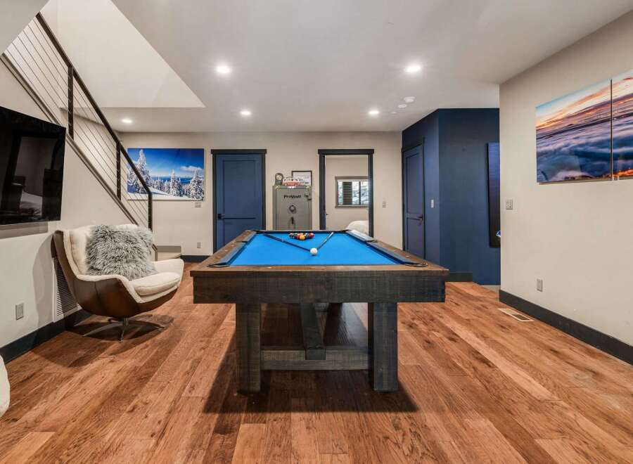 This stunning property boasts a luxurious game room, perfect for entertaining.