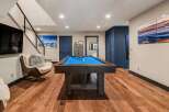 This stunning property boasts a luxurious game room, perfect for entertaining.