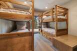 This stunning property features a cozy bunk room, perfect for accommodating guests or family.