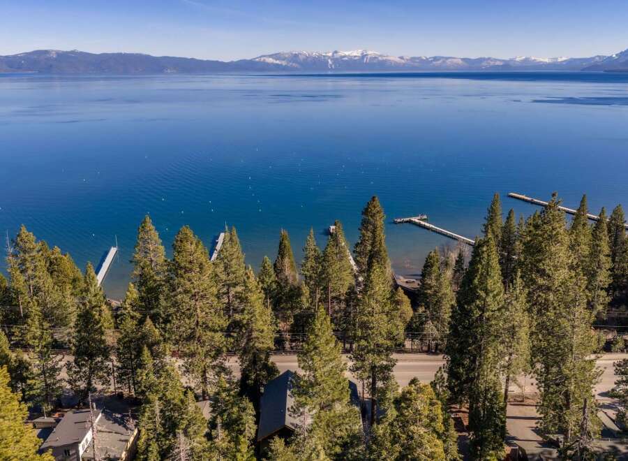 Experience the tranquility of lakeside living with this stunning property.