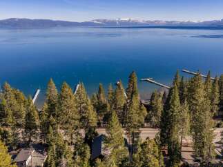 Experience the tranquility of lakeside living with this stunning property.