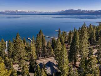 Experience the epitome of lakeside living with this stunning property.