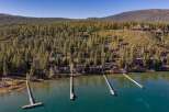 Discover waterfront luxury at this stunning property, featuring private docks and breathtaking views.