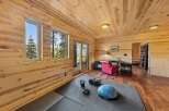 This stunning property boasts a beautifully designed home gym, perfect for maintaining a healthy lifestyle.