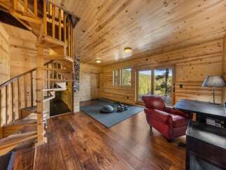 This stunning property boasts a unique blend of rustic charm and modern amenities.