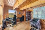 Step into a cozy and inviting home office, perfect for remote work or creative endeavors.