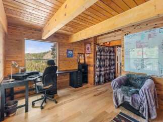 Step into a cozy and inviting home office, perfect for remote work or creative endeavors.