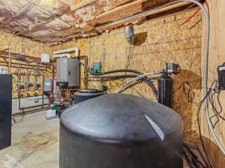 Explore the potential of this property with a well-equipped utility room.