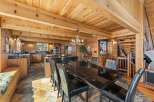 Step into rustic elegance with this stunning property featuring a spacious kitchen and dining area.