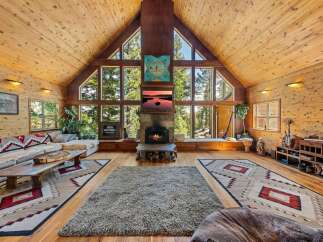Experience the ultimate in rustic luxury with this stunning cabin retreat.