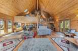 Step into luxury with this stunning cabin featuring a grand, open-concept design.