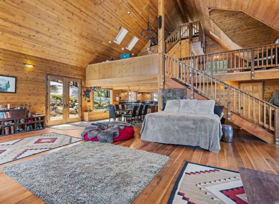 Step into rustic luxury in this stunning cabin-style home.