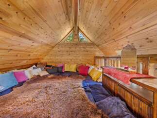 Discover the charm of this cozy loft space, perfect for relaxation and retreat.