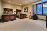 This luxurious bedroom boasts two king-size beds, perfect for guests or a family getaway.