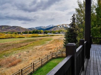 Mountain views and a spacious deck are just some of the features of this stunning property.