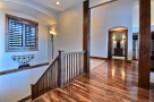 This stunning home boasts gleaming hardwood floors that flow seamlessly throughout the main living areas.