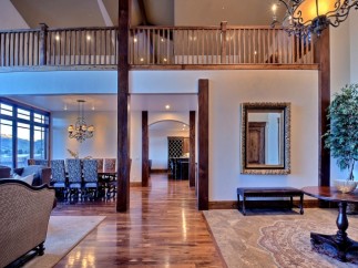This stunning home boasts a spacious open floor plan with hardwood floors, a grand dining area, and a luxurious living space.
