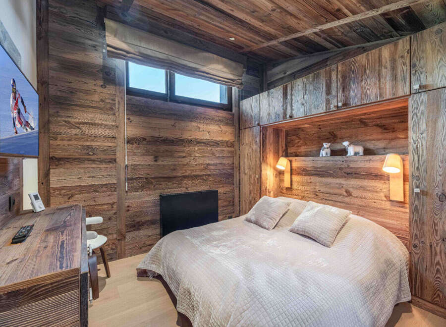 Experience rustic luxury in this stunning bedroom.