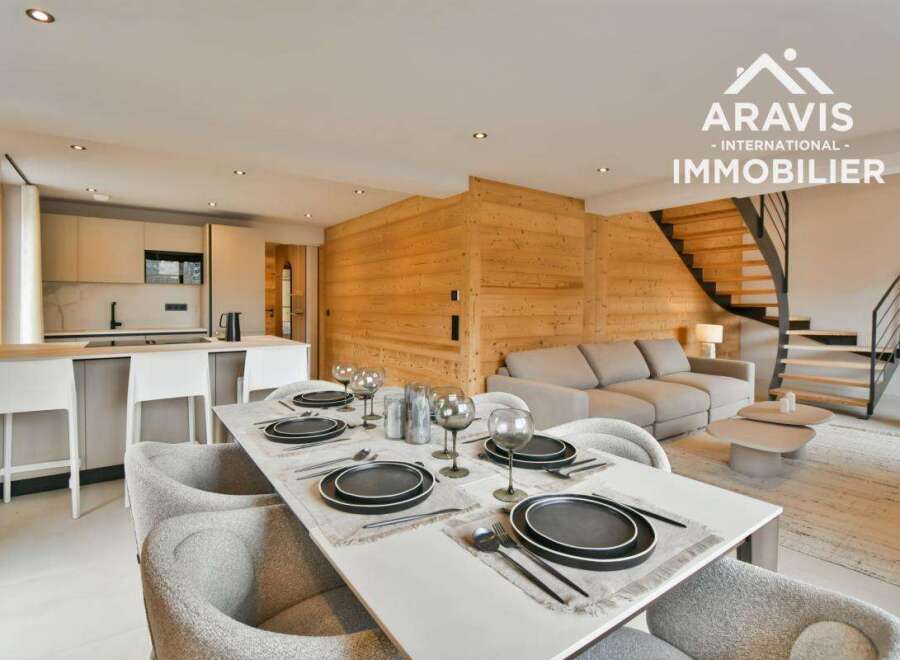 Discover luxury living in this stunning property, featuring a modern kitchen and a stylish dining area perfect for entertaining.