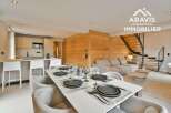 Discover luxury living in this stunning property, featuring a modern kitchen and a stylish dining area perfect for entertaining.