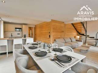 Discover luxury living in this stunning property, featuring a modern kitchen and a stylish dining area perfect for entertaining.