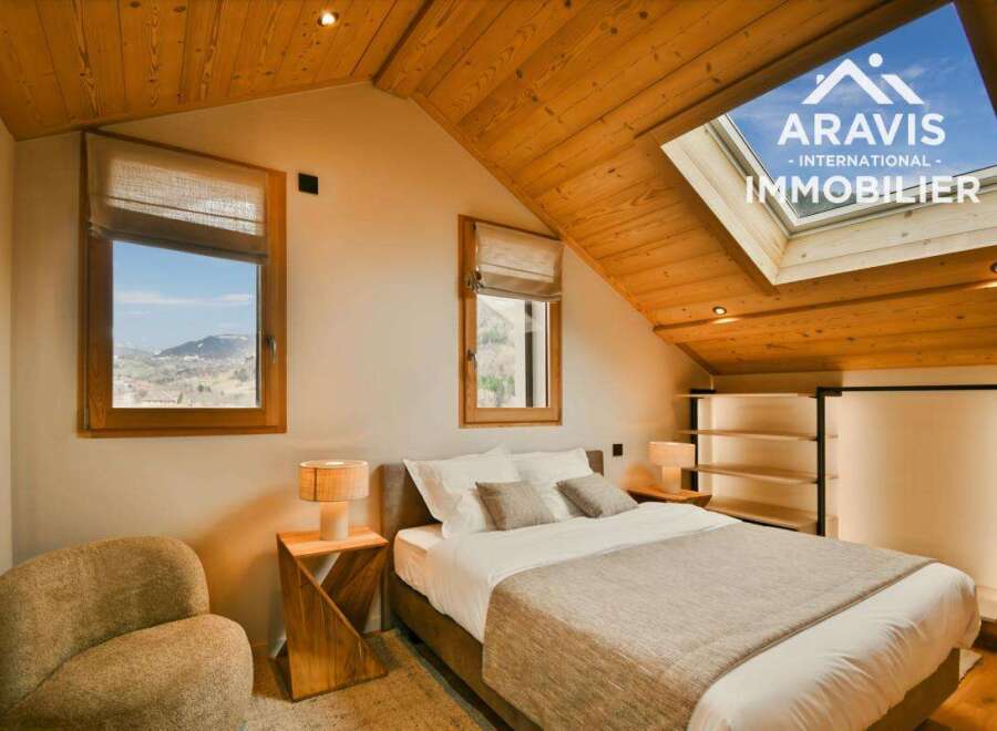 Discover the charm of this stunning property, featuring a cozy bedroom with a comfortable bed and stylish decor.