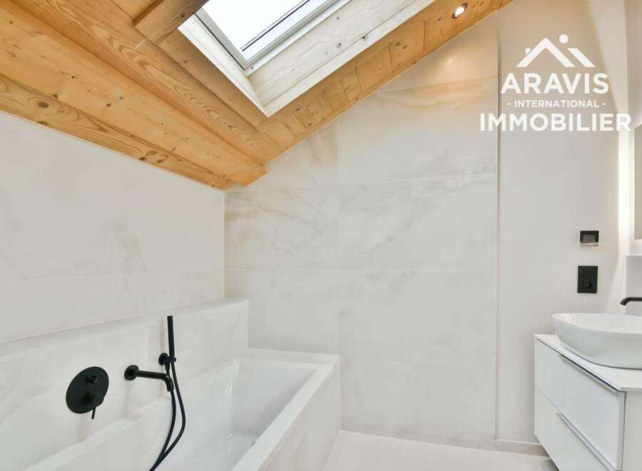 This modern bathroom boasts a sleek design with clean lines and a bright, airy feel.
