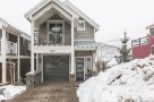 This charming 2-story townhome boasts a spacious garage, private balcony, and modern interior.