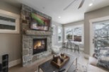 This stunning property boasts a cozy stone fireplace, perfect for relaxing winter evenings.