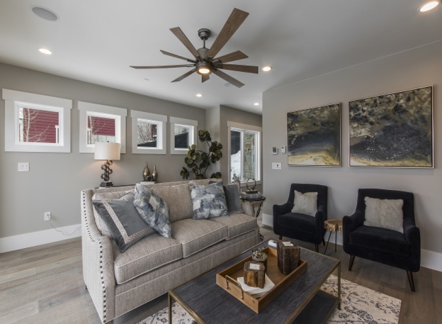 This stunning living room boasts a spacious and open floor plan, perfect for entertaining.
