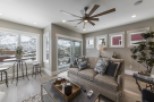This stunning property boasts an open floor plan with floor-to-ceiling windows offering breathtaking mountain views.