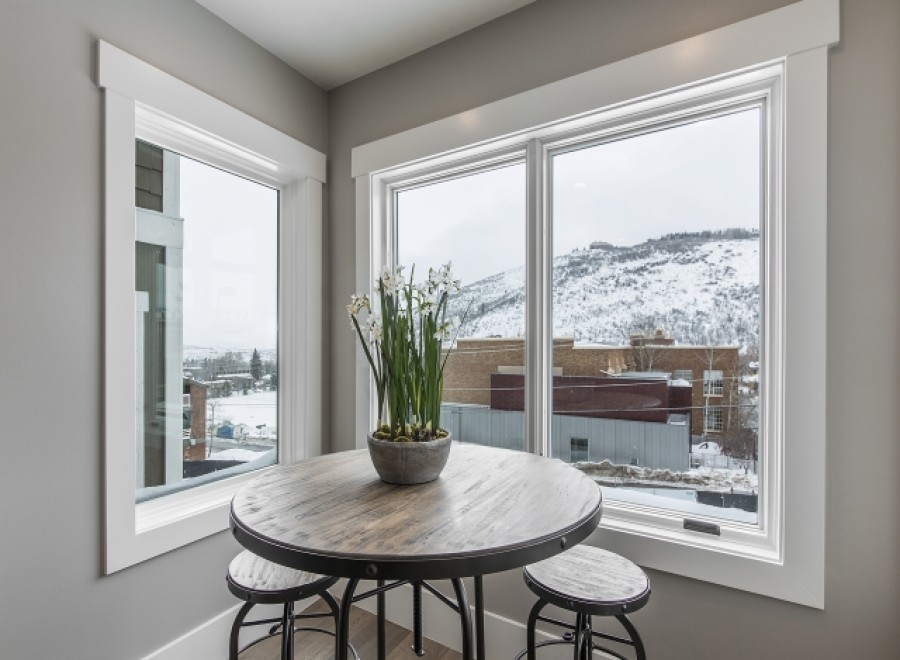 Cozy corner breakfast nook with stunning mountain views.