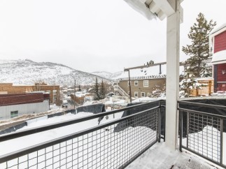 Enjoy breathtaking mountain views from your private balcony, perfect for relaxing after a day on the slopes.