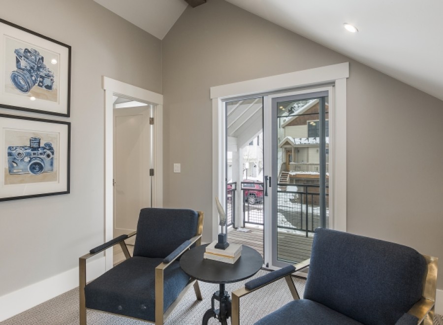 This stunning property boasts a bright and airy interior with large windows offering breathtaking views.