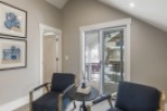 This stunning property boasts a bright and airy interior with large windows offering breathtaking views.