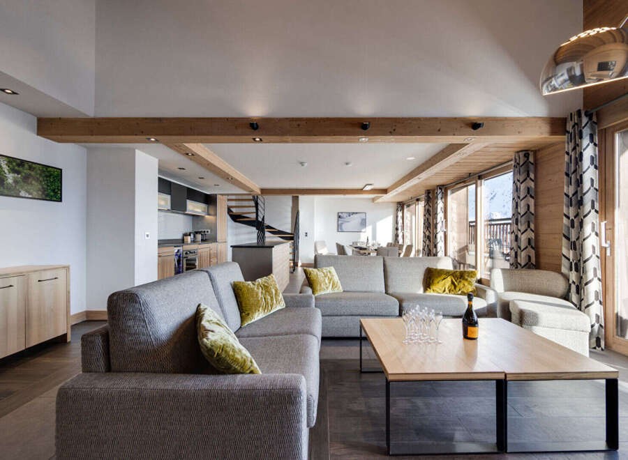 Experience luxury living in this stunning property, featuring a spacious living area with a modern design.