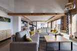 Experience luxury living in this stunning property, featuring a spacious living area with a modern design.