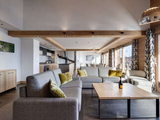 Experience luxury living in this stunning property, featuring a spacious living area with a modern design.