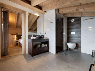 Experience luxury living in this stunning property featuring a beautifully designed bathroom.