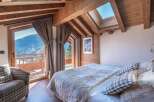 Experience the ultimate in mountain living with this stunning bedroom.