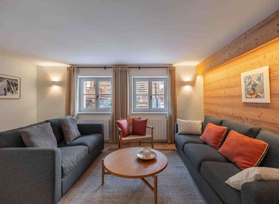 Step into this inviting living space, perfect for relaxation and entertaining.