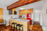 This charming kitchen boasts a modern design with a touch of vintage flair.