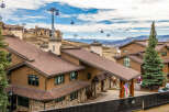 This stunning property boasts a prime location with breathtaking mountain views and convenient access to a ski lift.
