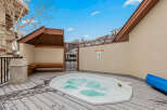 Relax and unwind in this luxurious outdoor hot tub, perfect for enjoying the beautiful surroundings.