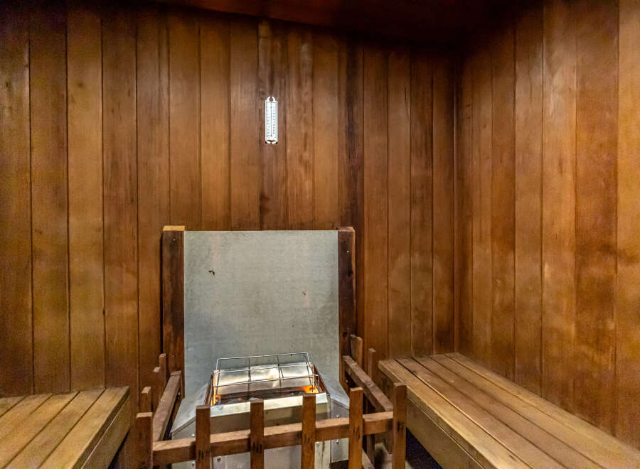Step into relaxation with this inviting sauna, perfect for unwinding after a long day.
